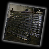 We hang many parts on our unique powdercoating parts racks!